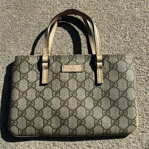 Gucci handbag. Petite. Classic Gucci Diamante print. Purchased in Italy.